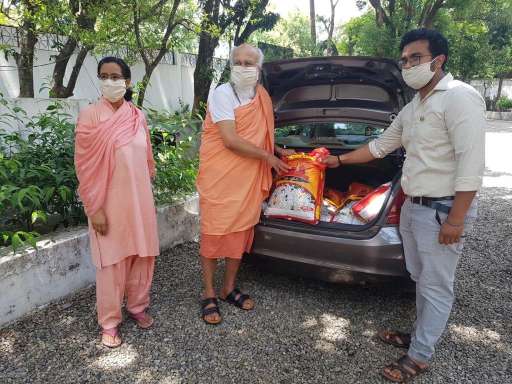 Distribution of rations to the needy at Dehradun Ashram photo2